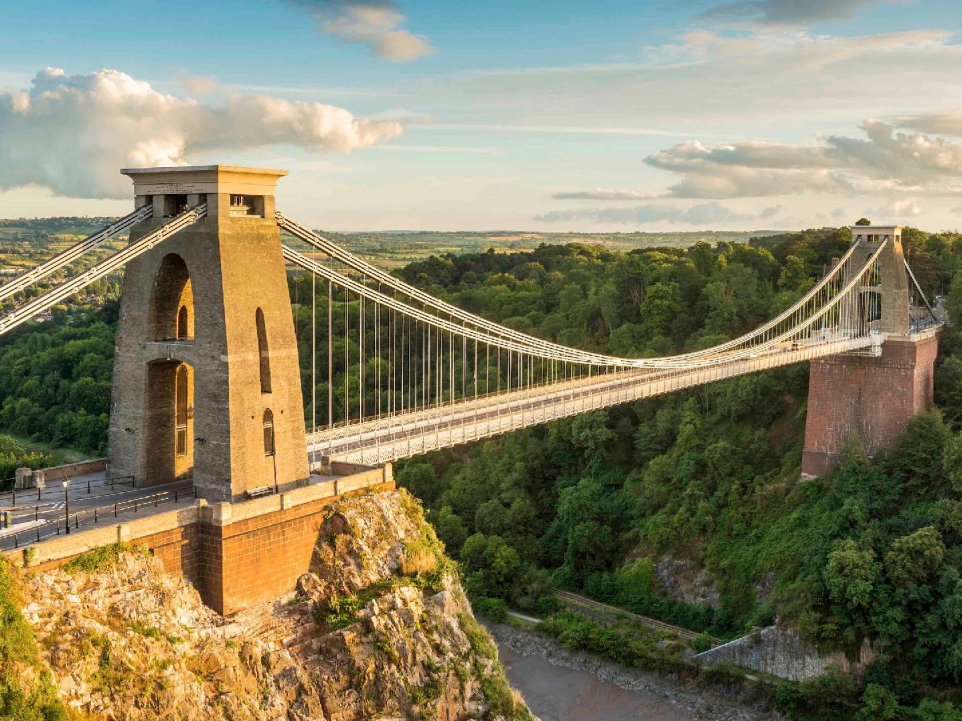 Image of the iconic Clifton Suspension Bridge in Bristol, showcasing its stunning architecture against a clear blue sky. Image of the iconic Clifton Suspension Bridge in Bristol, showcasing its stunning architecture against a clear blue sky.