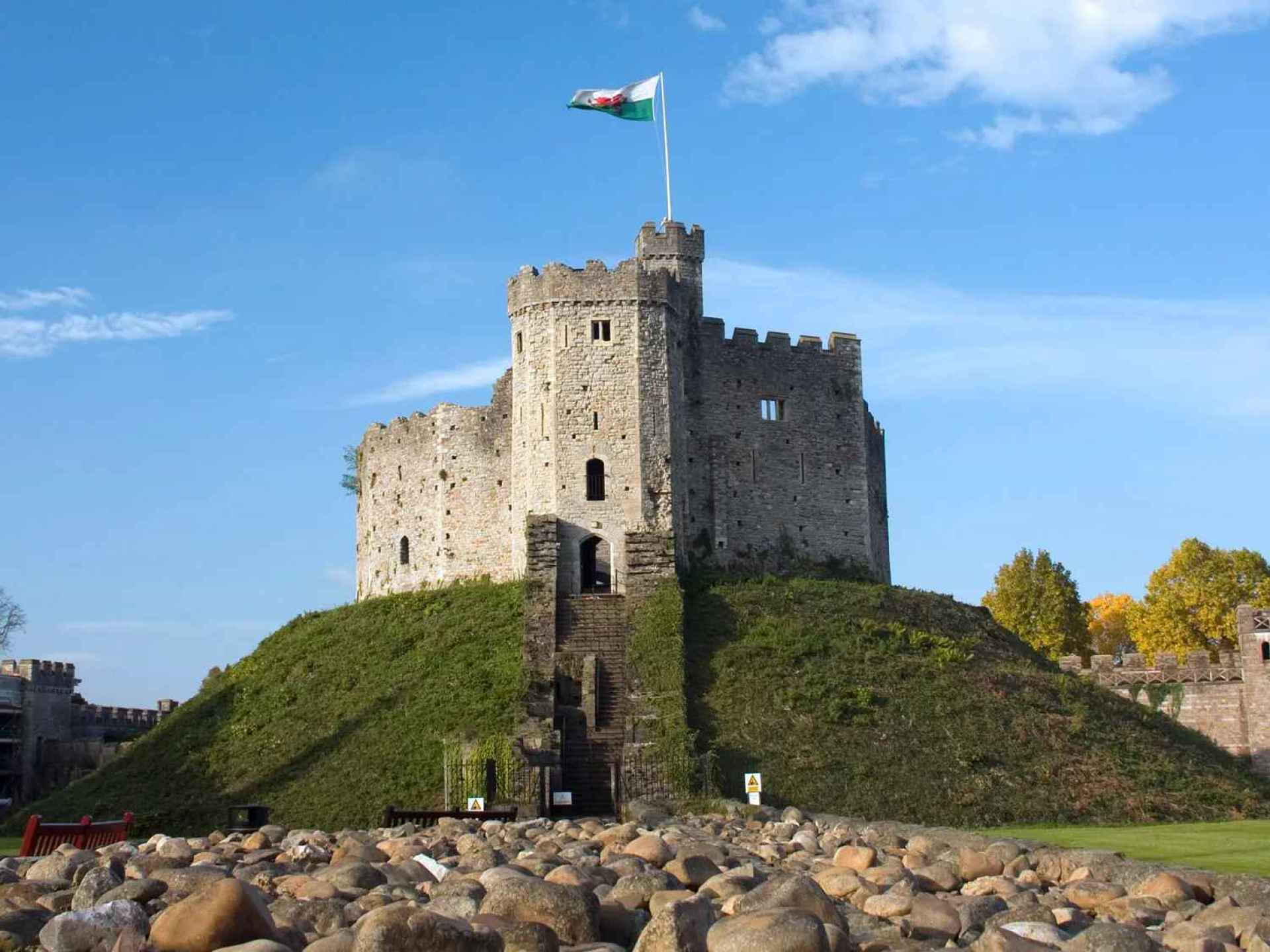A stunning view of Cardiff Castle showcasing its historic architecture and lush greenery in Cardiff. A stunning view of Cardiff Castle showcasing its historic architecture and lush greenery in Cardiff.