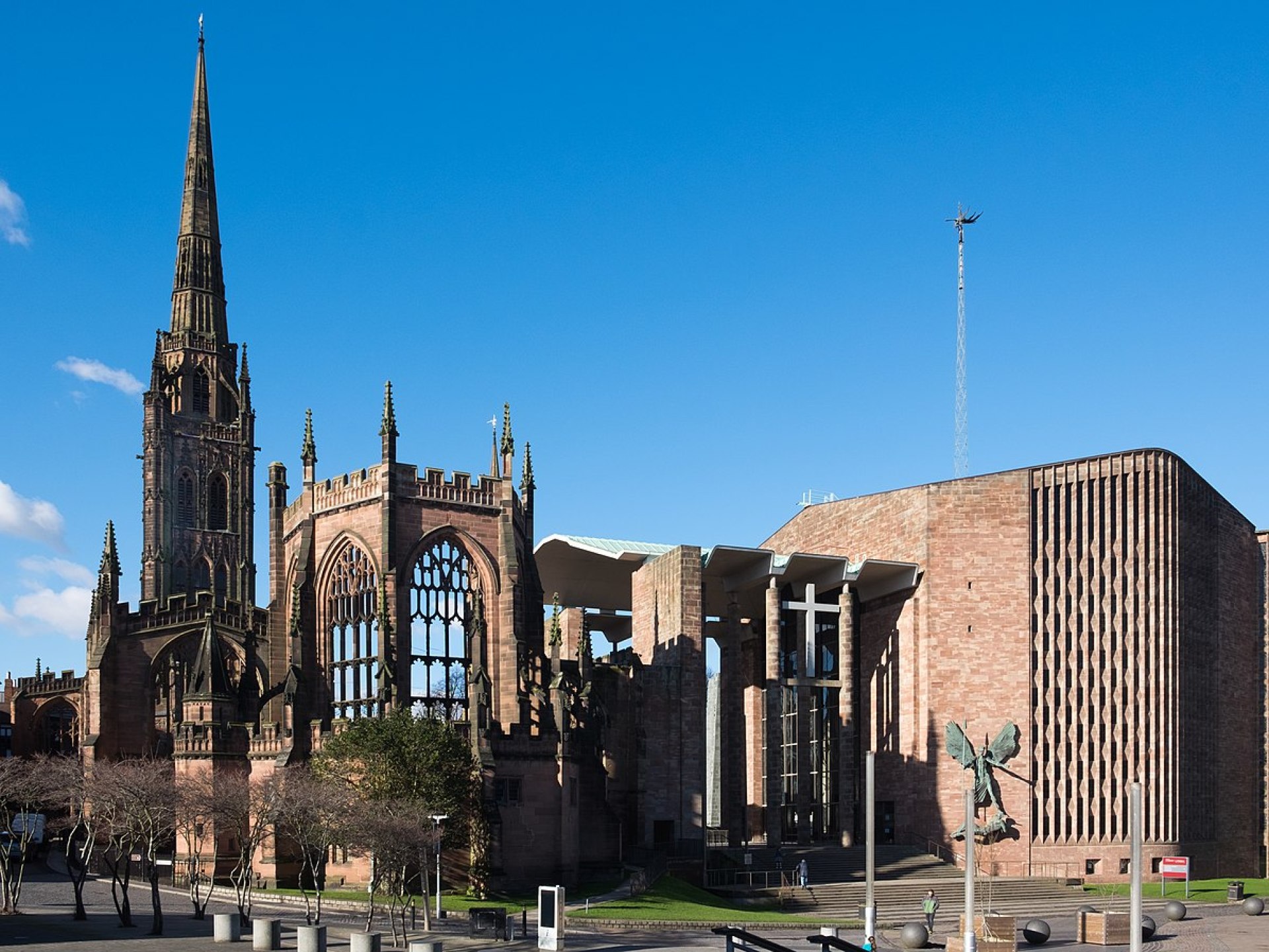 Stunning view of Coventry Cathedral, showcasing its modern architecture and historical significance. Stunning view of Coventry Cathedral, showcasing its modern architecture and historical significance.
