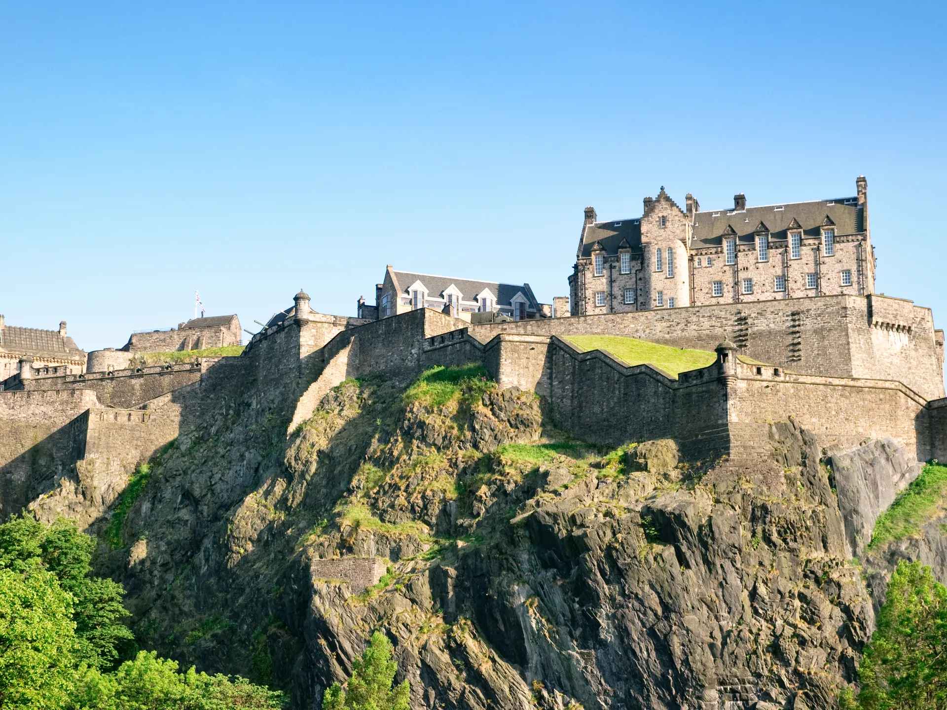 A scenic view of Edinburgh Castle, showcasing its historic architecture and panoramic views of the city of Edinburgh. A scenic view of Edinburgh Castle, showcasing its historic architecture and panoramic views of the city of Edinburgh.