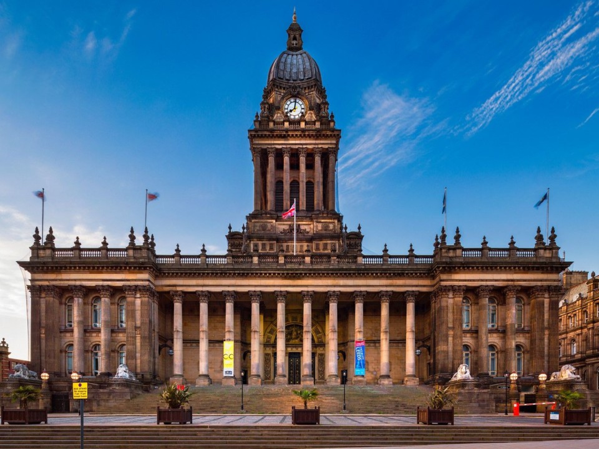 A view of Leeds Town Hall showcasing its impressive architecture and surrounding area in Leeds, UK. A view of Leeds Town Hall showcasing its impressive architecture and surrounding area in Leeds, UK.
