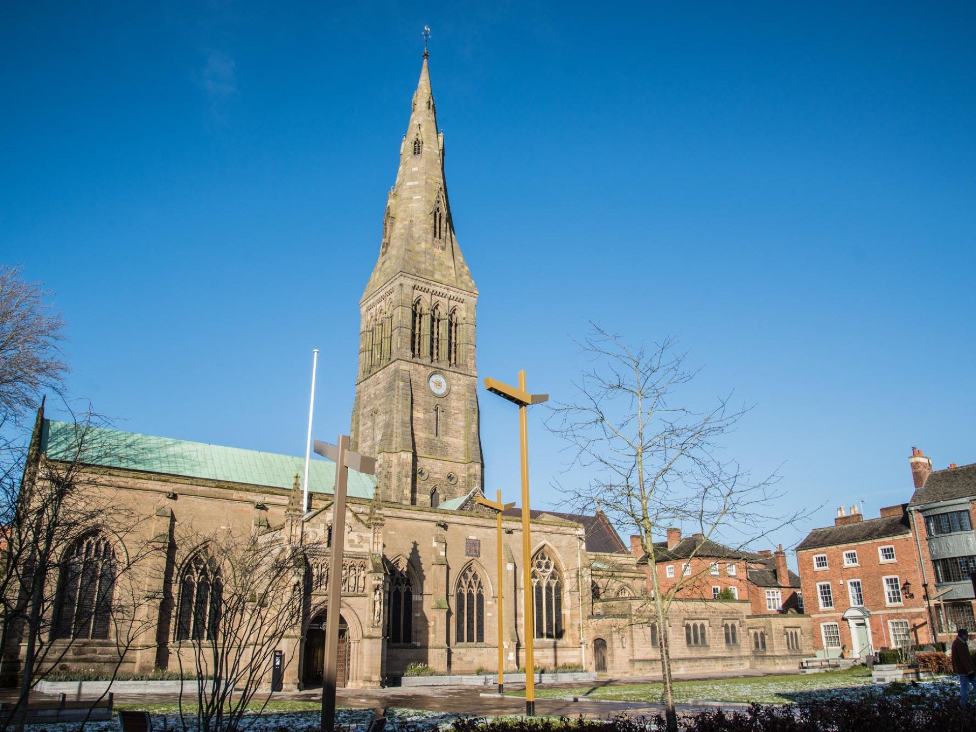 A scenic view of Leicester Cathedral showcasing its stunning architecture and surrounding greenery. A scenic view of Leicester Cathedral showcasing its stunning architecture and surrounding greenery.