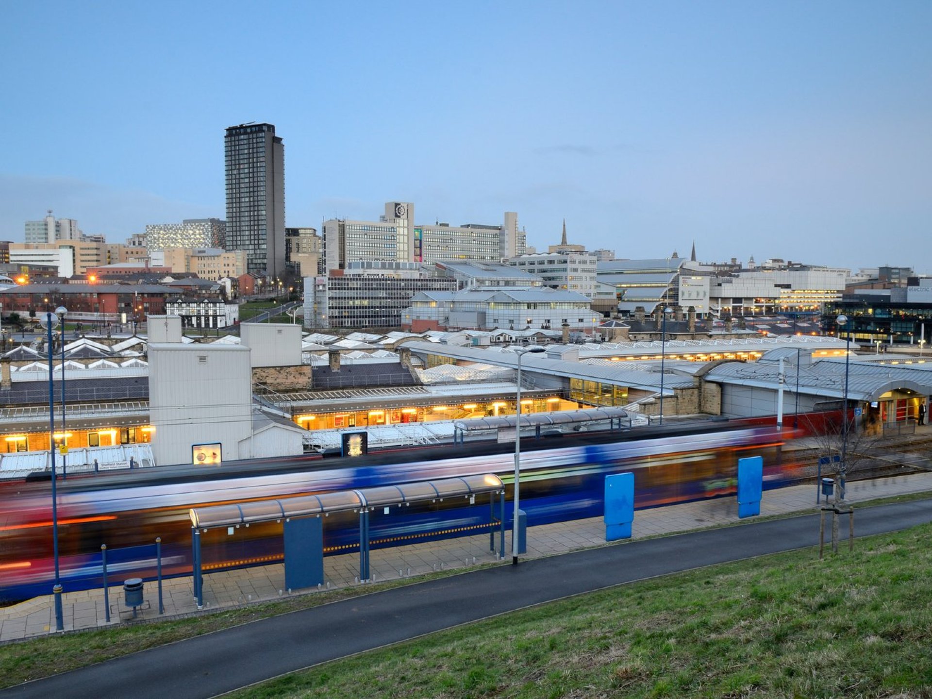 A stunning skyline view of Sheffield, showcasing the city's blend of modern architecture and historical landmarks against a vibrant sky. A stunning skyline view of Sheffield, showcasing the city's blend of modern architecture and historical landmarks against a vibrant sky.