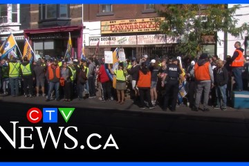 Workers shout ‘hands off Canada Post!’ at rally against federal government’s changes Workers shout ‘hands off Canada Post!’ at rally against federal government’s changes