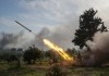 Scores killed as Assad loyalists clash with Syrian security forces