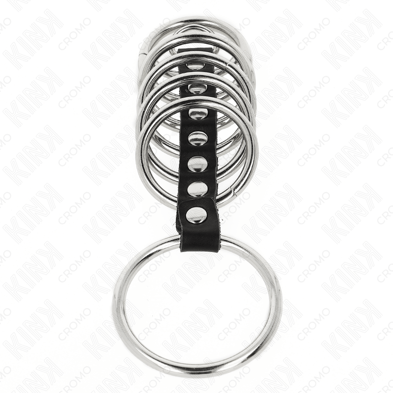 KINK – 7 ANNEAUX PÉNIS EN MÉTAL DE 3,2 CM À 5 CM CONNECTÉS PAR DU CUIR