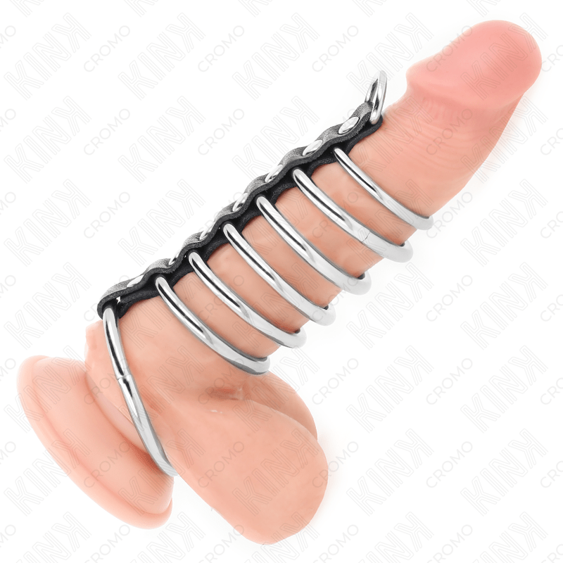 KINK – 7 ANNEAUX PÉNIS EN MÉTAL DE 3,2 CM À 5 CM CONNECTÉS PAR DU CUIR