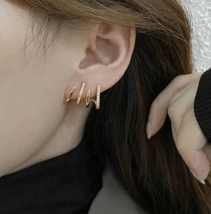 Pendientes de cuatro garras