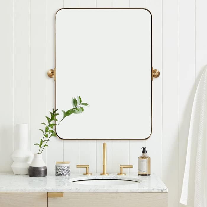 Espejos de baño de oro cepillado de 28 x 36 pulgadas para pared, espejo giratorio de baño con marco de metal de latón con esquina redondeada,