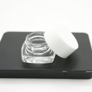 Recipientes de vidrio a prueba de niños de 0.2 fl oz (paquete de 50) con base de almohada, tarro de tapa redonda (tapa blanca) Recipientes de vidrio a prueba de niños de 0.2 fl oz (paquete de 50) con base de almohada, tarro de tapa redonda (tapa blanca)