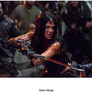 The 100 Marie Avgeropoulos as Octavia Blake Looking Bloodied and Intense 8 x 10 Inch Photo The 100 Marie Avgeropoulos as Octavia Blake Looking Bloodied and Intense 8 x 10 Inch Photo