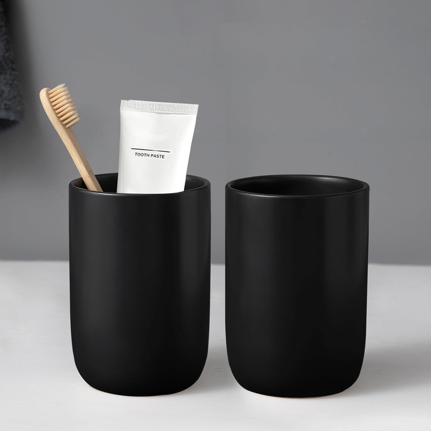 Soportes para cepillos de dientes negros mate para baños, juego de 2 tazas de cerámica para pasta de dientes, vasos de baño negros, vaso de baño