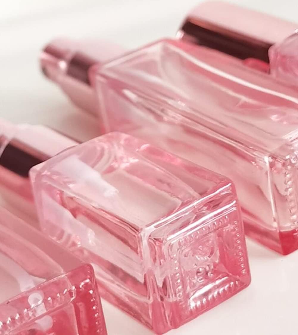 Botellas de perfume de vidrio de 0.7 onzas líquidas, botellas vacías de perfume en aerosol rosa con tapa de oro rosa, recargable, portátil,