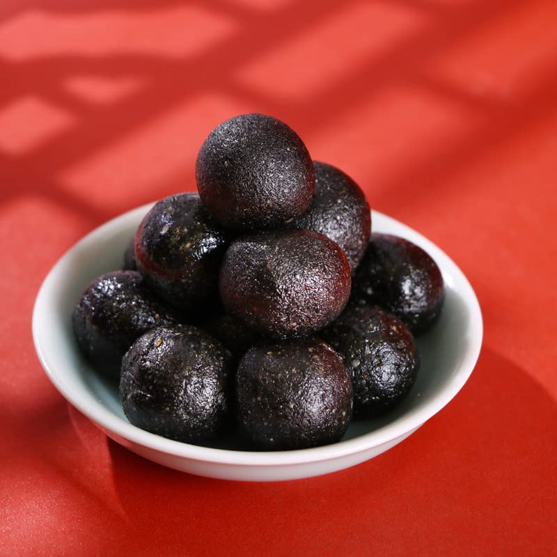 Bolas de sésamo negro, píldoras de sésamo negro hechas a mano con miel pura, píldora ufa, aperitivos nutritivos y saludables con frijoles negros,
