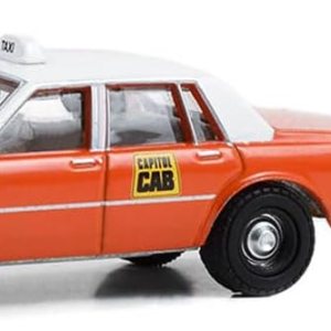 Greenlight 97150-B The Hobby Shop Series 15-1981 Chevy Impala Capitol Cab Taxi con Hombre en Traje Escala 164 Greenlight 97150-B The Hobby Shop Series 15-1981 Chevy Impala Capitol Cab Taxi con Hombre en Traje Escala 164