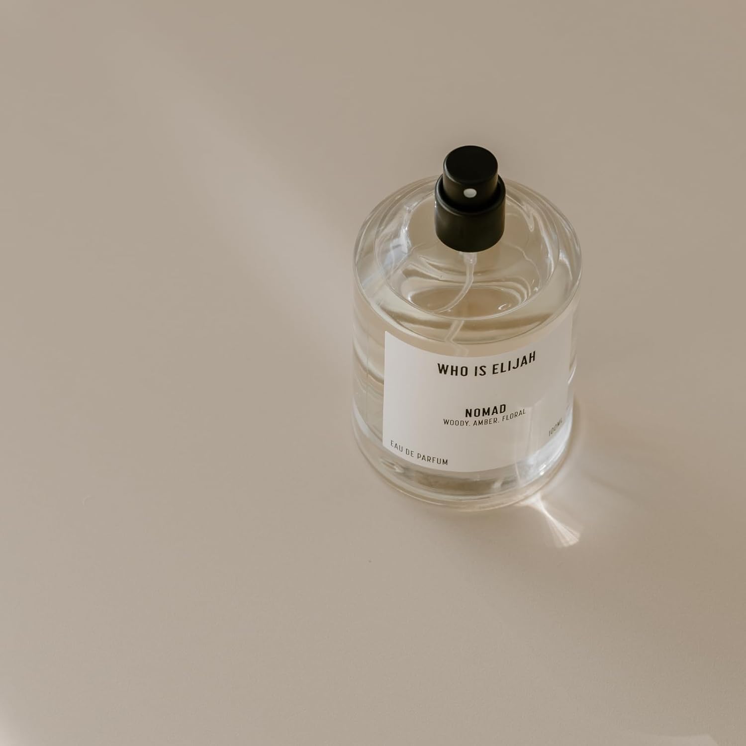 Nomad Eau De Parfum  Perfume en aerosol unisex ámbar gris de larga duración, notas de aroma amaderado de jazmín egipcio, rosa, azafrán, abeto,