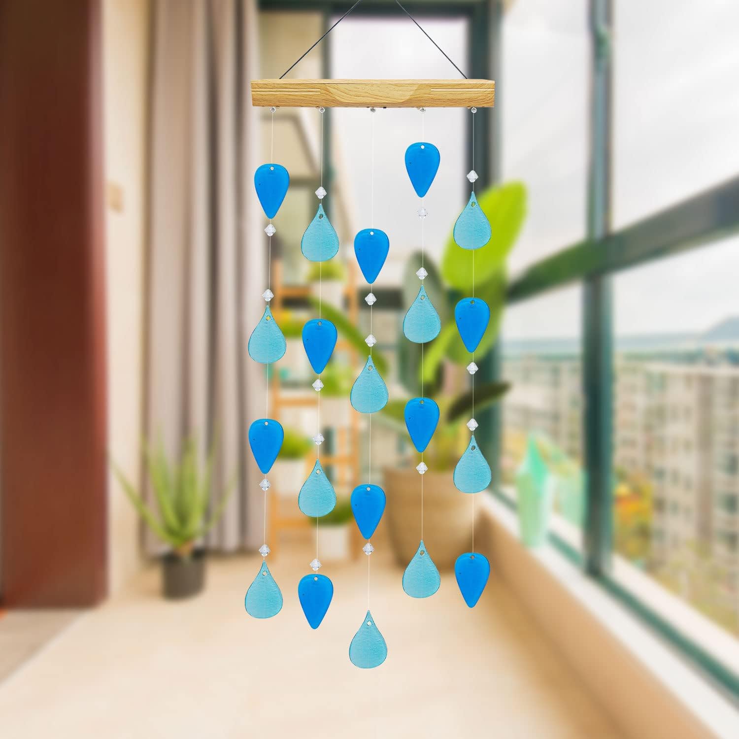 Topadorn Campanillas de viento decorativas con luz solar para el hogar, jardín y patio, decoración de campanillas de viento móviles de cristal azul