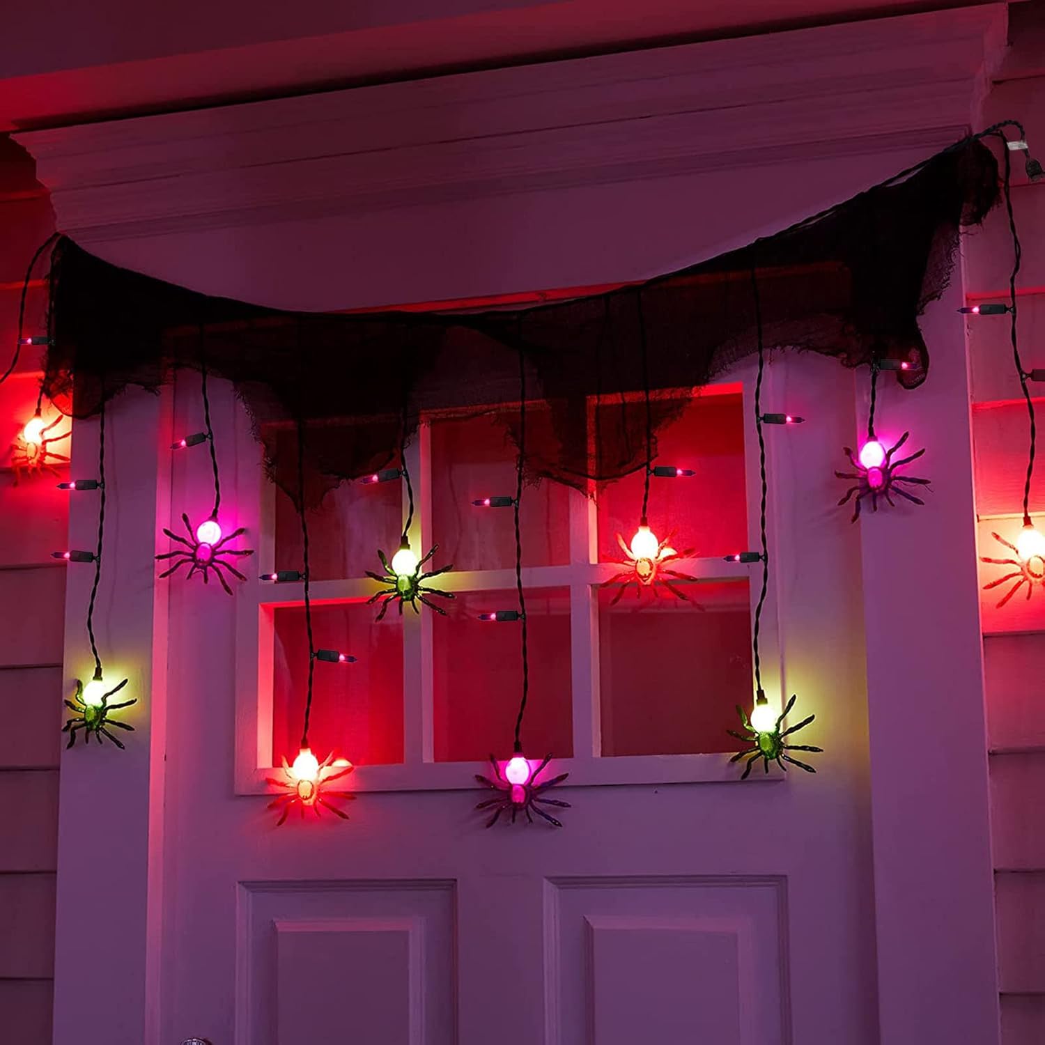 Jasneniebo Luces decorativas de Halloween, 25 bombillas enchufables de 7 pies, tira de luces de Halloween con 10 arañas conectables, cortina de