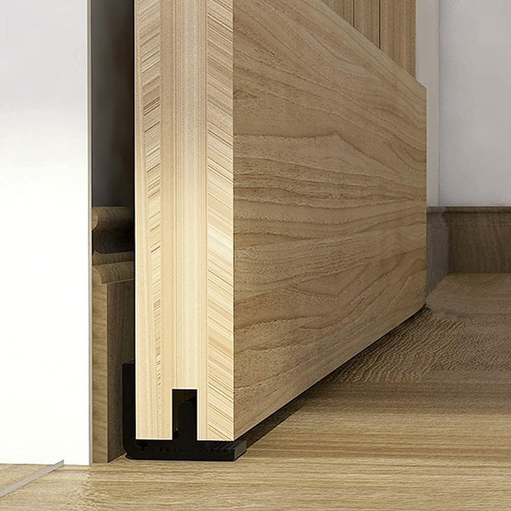 CCJH Guía de piso inferior para puerta corrediza de granero, montaje en pared ajustable, sin necesidad de perforación en el suelo (negro, 1 unidad)