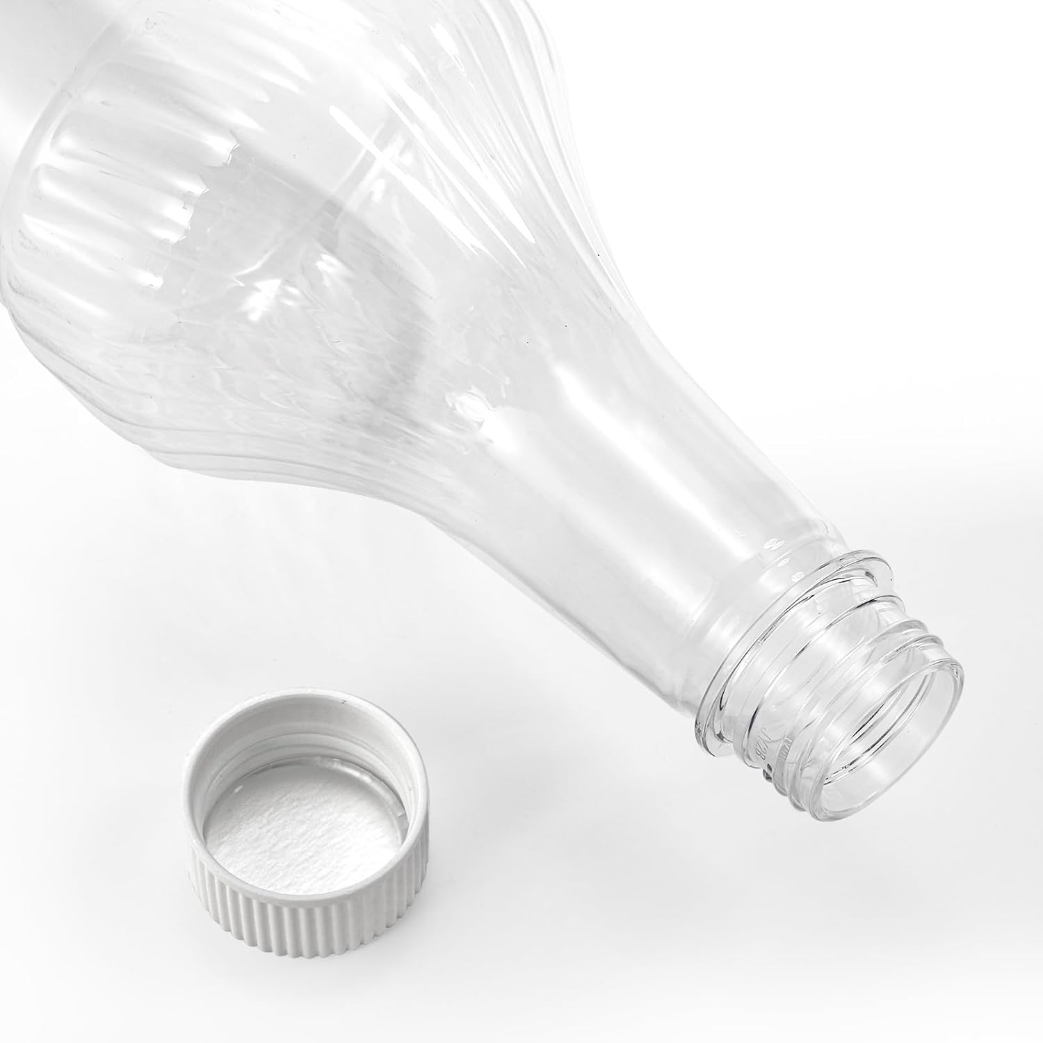 Paquete de 8 botellas de refresco de plástico de 33 onzas con tapas, contenedor de jugo de PET transparente vacío reutilizable de 1 litro, botellas