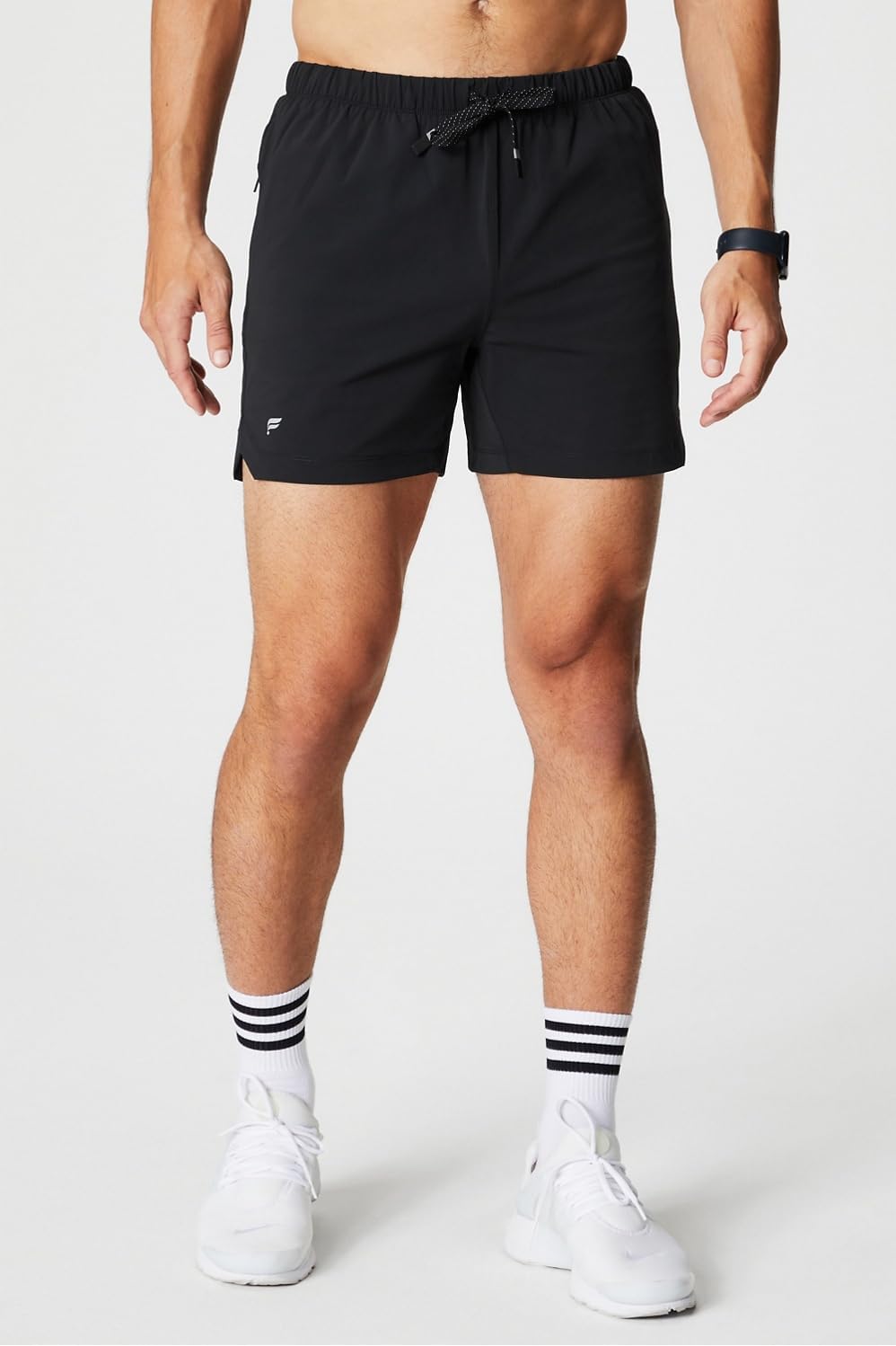 Fabletics Pantalón corto The One para hombre, entrenamiento, natación, ligero, de secado rápido, bolsillo con cremallera, tejido elástico