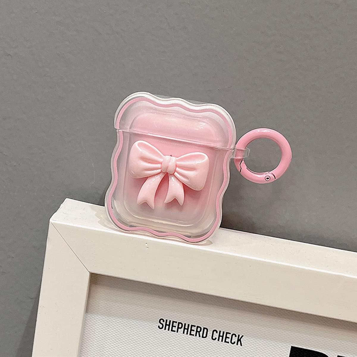 Bonita funda para AirPod con llavero de lazo rosa, diseño degradado transparente, borde ondulado, funda protectora suave compatible con AirPods de 1