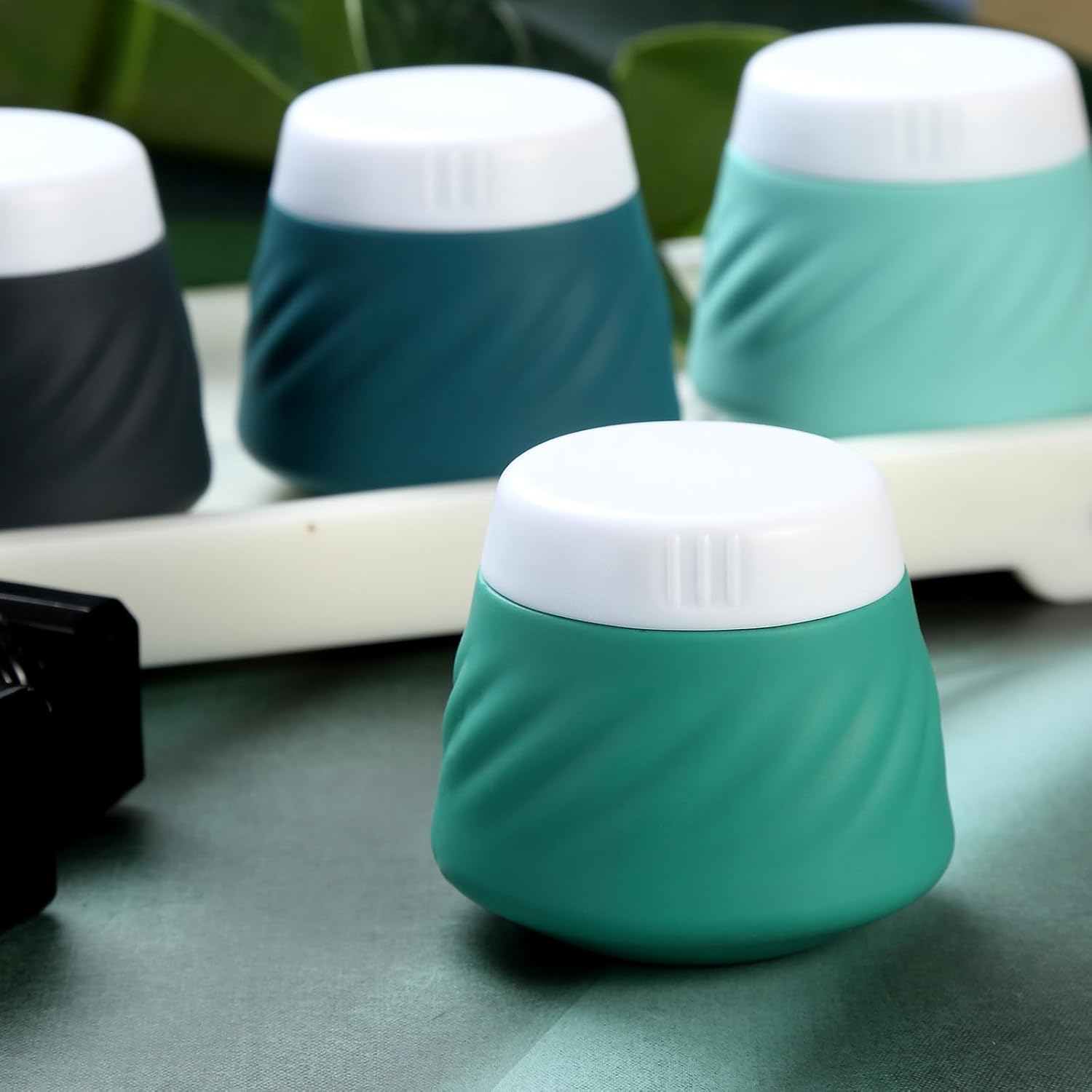 Gemice Recipientes de viaje para artículos de tocador, tarros de crema de silicona aprobados por la TSA recipientes de tamaño de viaje con bolsa