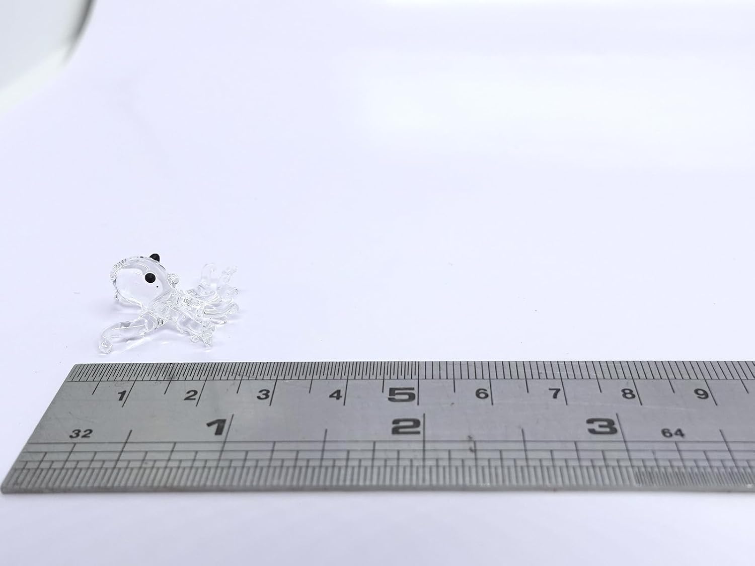 Sansukjai Figuras pequeñas de pulpo, vidrio soplado a mano, animales, regalo coleccionable para decoración del hogar (líquido transparente)