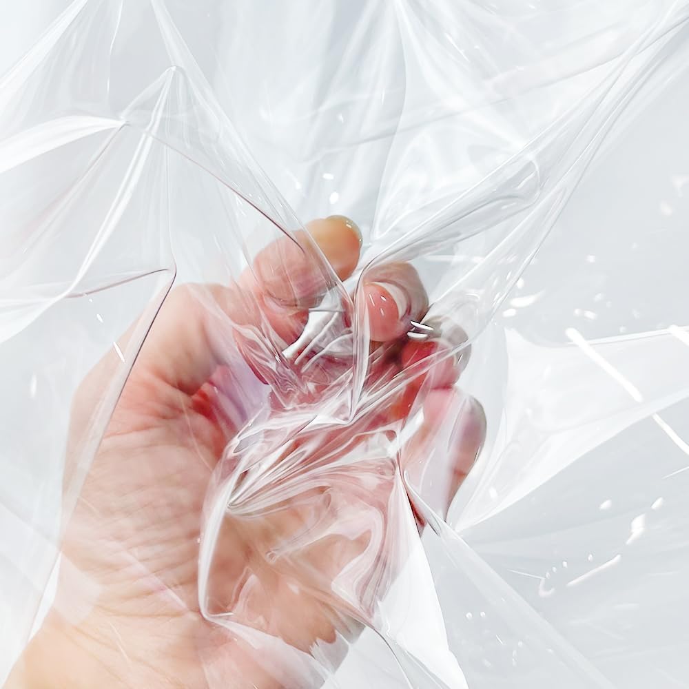 Tela de vinilo TPU transparente de 54 pulgadas de ancho, vinilo transparente impermeable de calibre 12, vinilo transparente multiusos vendido por