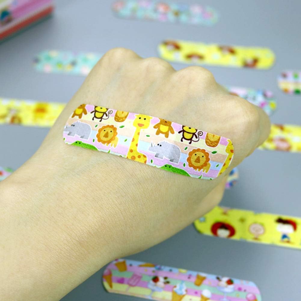 ikasus Vendajes de dibujos animados para niños, bonitos diseños de dibujos animados, como calcomanías, vendajes adhesivos de tela flexible, vendajes