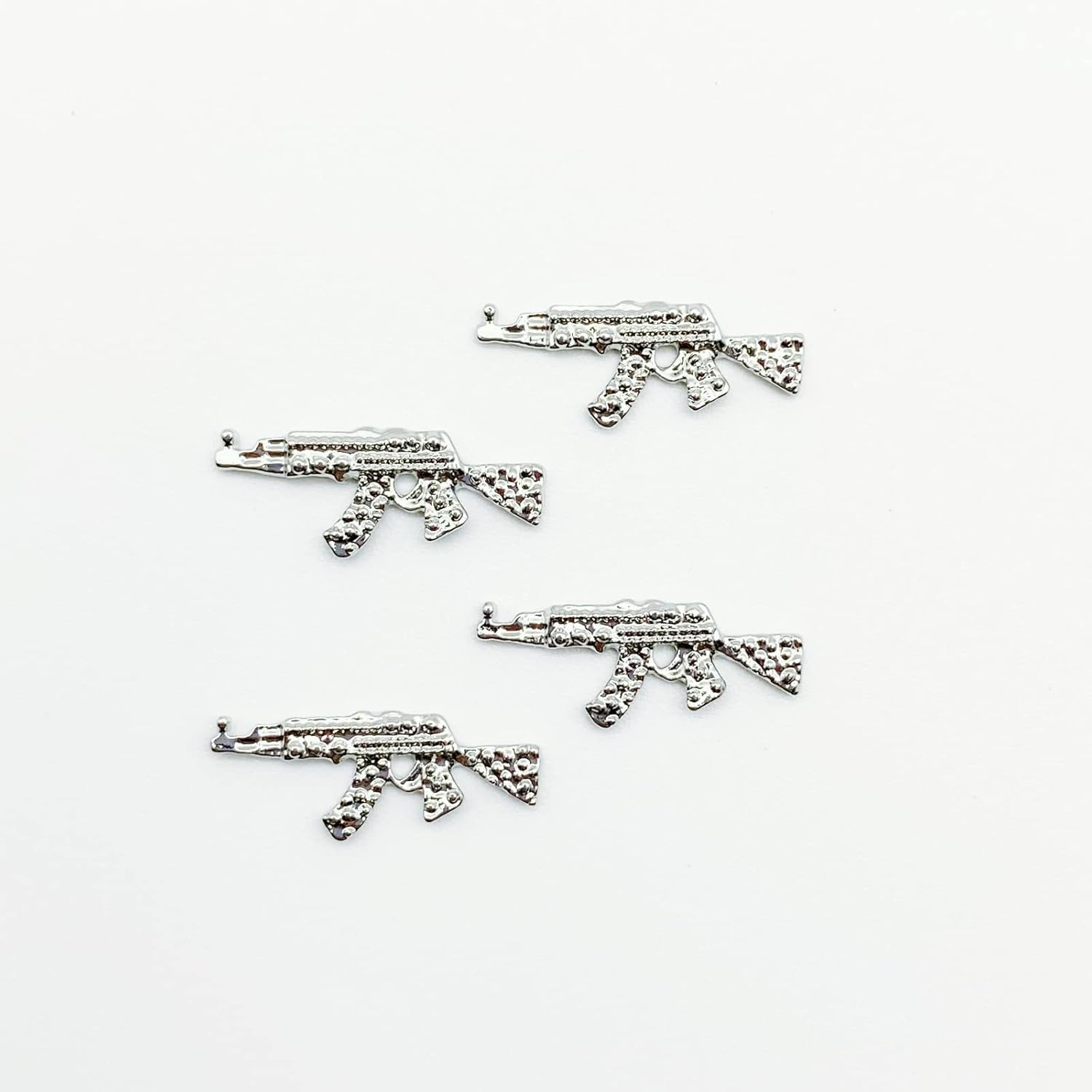 Juego de 40 dijes de aleación 3D para uñas, pistola de metal brillante con diamantes de imitación, dijes de arte de uñas AK para armas, diamantes de