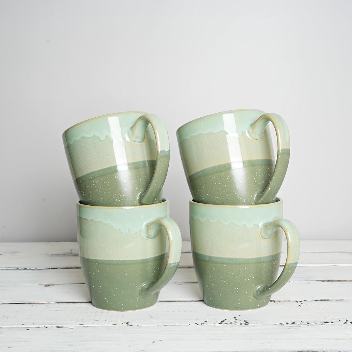 Bosmarlin Juego de 4 tazas de café de cerámica, 17 onzas, tazas de café verdes con mango grande, aptas para microondas, esmalte reactivo único
