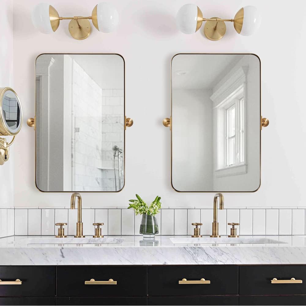 Espejos de baño de oro cepillado de 28 x 36 pulgadas para pared, espejo giratorio de baño con marco de metal de latón con esquina redondeada,