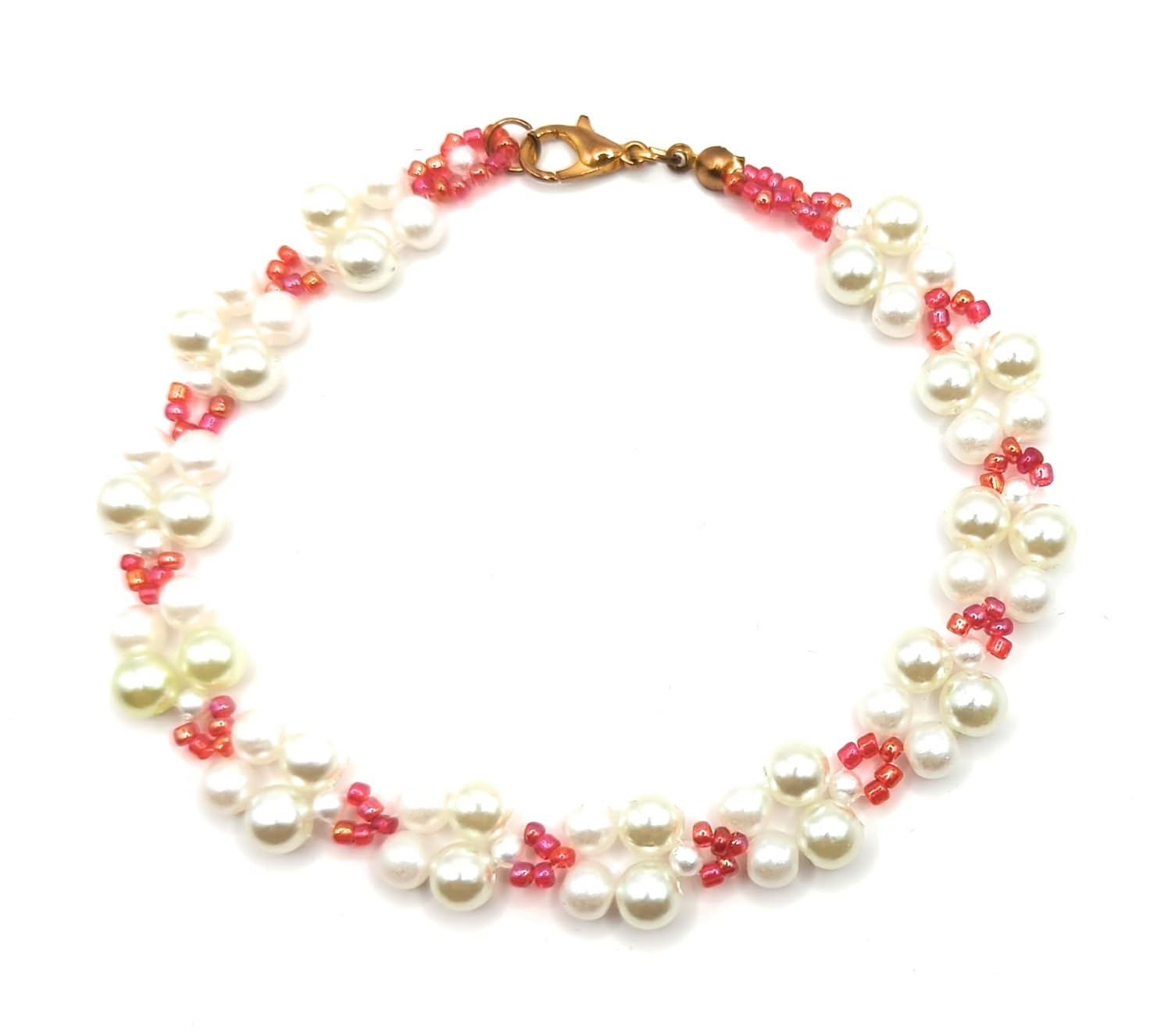 Elegante brazalete para dama hecho a mano de perlas fantasia y cuentas de vidrio de 9″ de largo, ideal para regalo, se envía empaque según muestra.