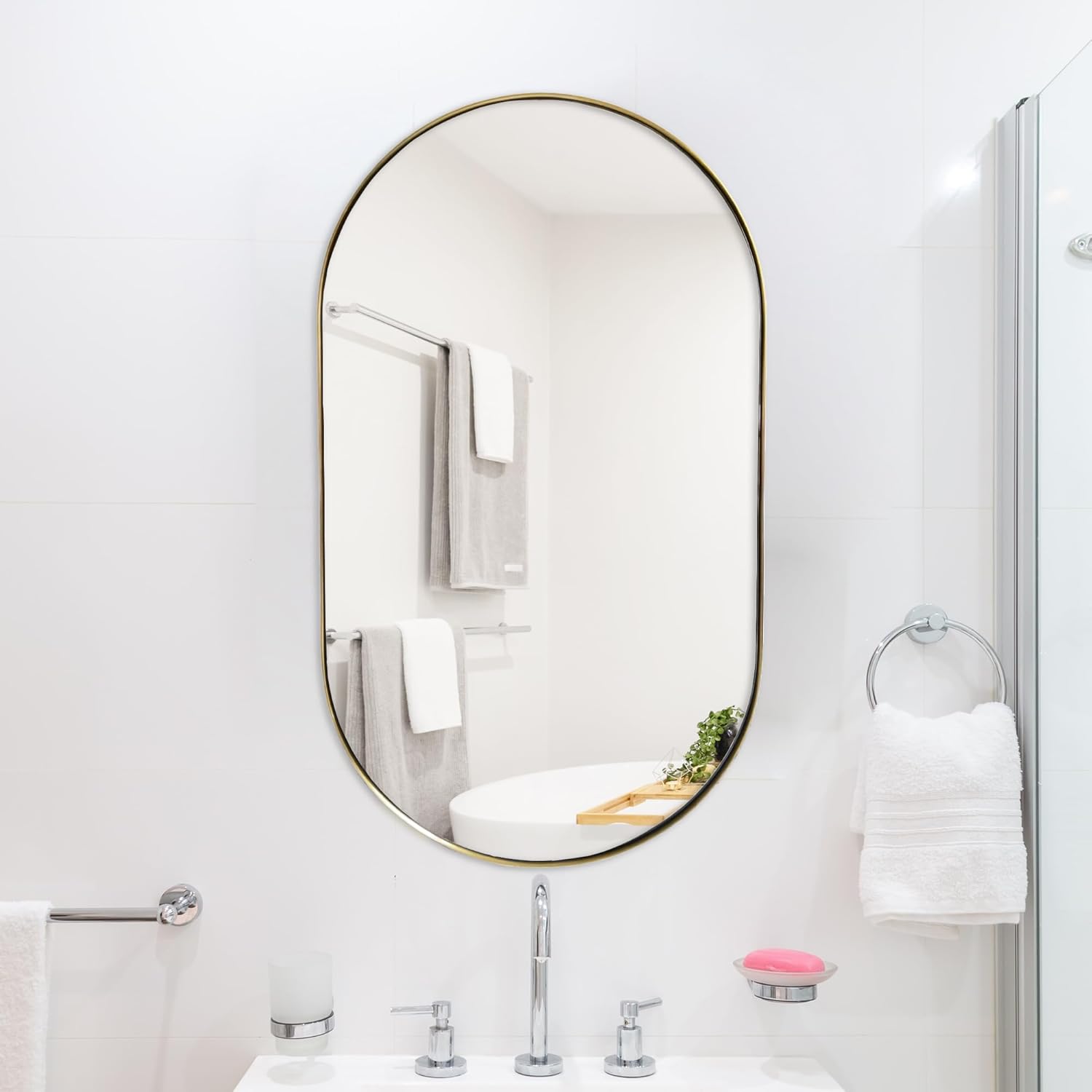 TUSIWIT Espejo de pared ovalado dorado con forma de píldora, espejo de baño con marco de acero inoxidable, espejo de pared decorativo montado