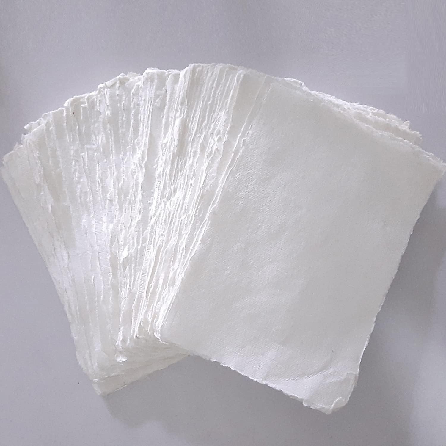 E-Tailor Hojas sueltas de papel de algodón hechas a mano con borde de cubierta de 130 GSM, color blanco marfil (paquete de 1-5×7-50-hojas)