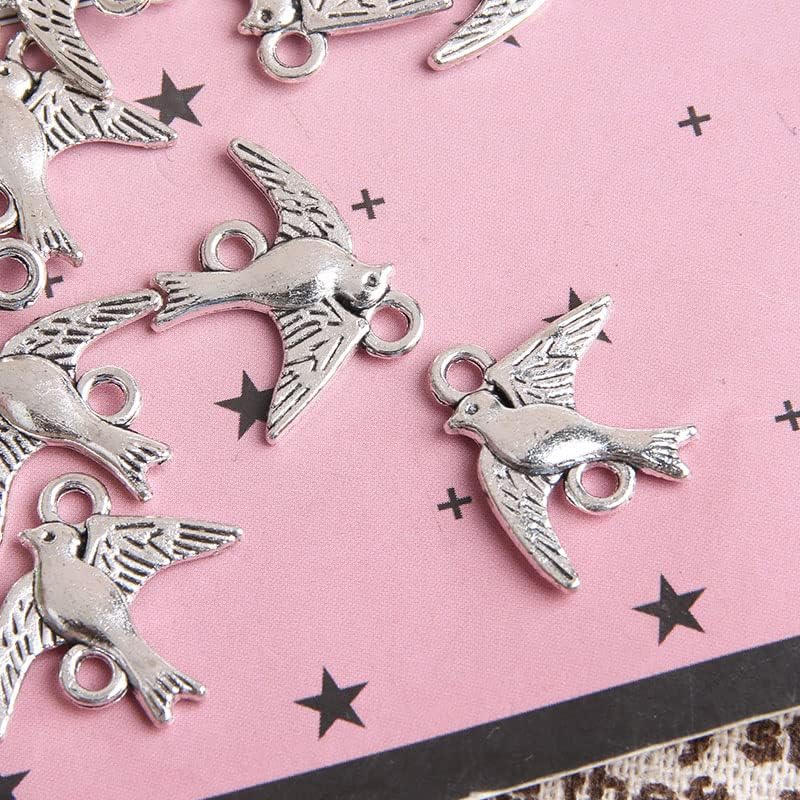 Opexicos 100 piezas de plata antigua golondrina pájaro encanto conector pulsera collar fabricación de joyas hecho a mano DIY