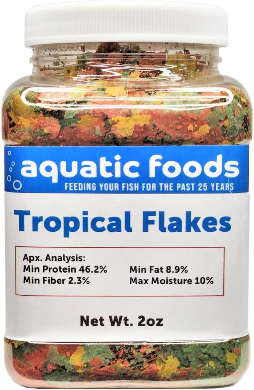 Copos de pescado tropical premium, para todos los peces tropicales de la comunidad, cíclidos y peces de estanque. Frasco pequeño de 2 onzas