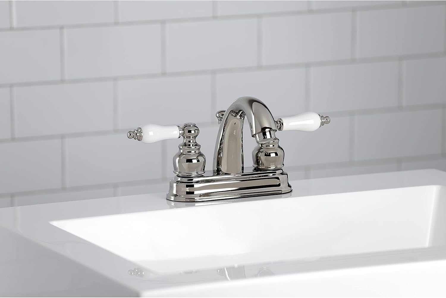Kingston Brass KB5616PL Restoration – Grifo de baño central de 4 pulgadas, níquel pulido