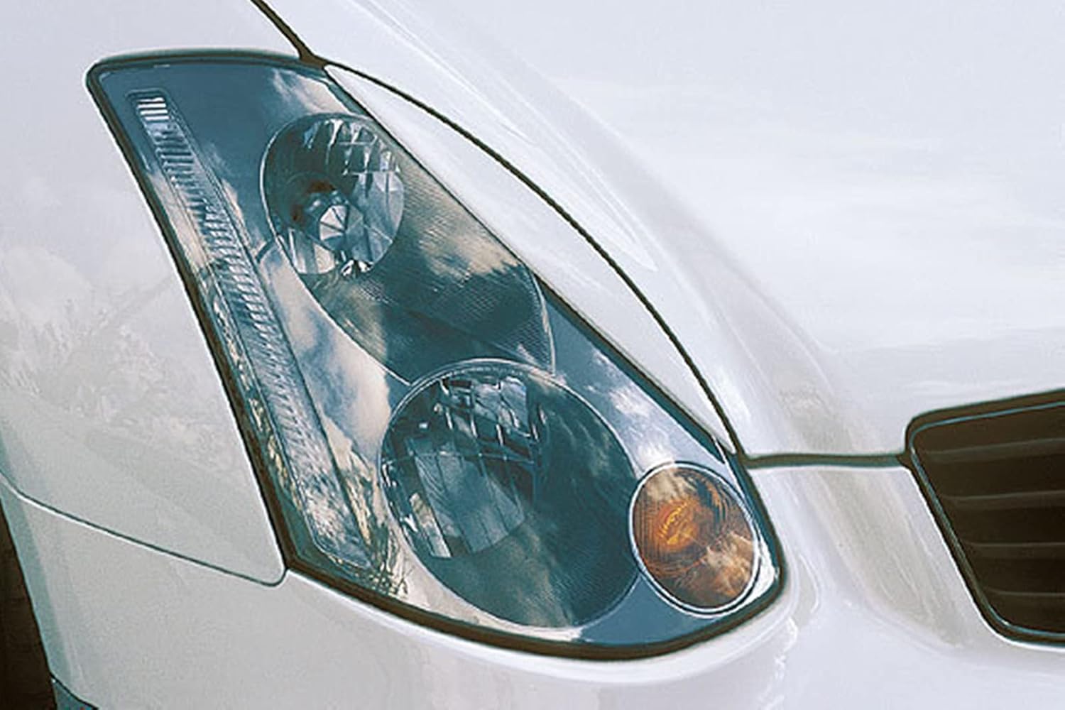Ajuste de la ceja del párpado de la faro de la fibra de carbono para Infiniti G35 V35 2002-2006 4 puerta