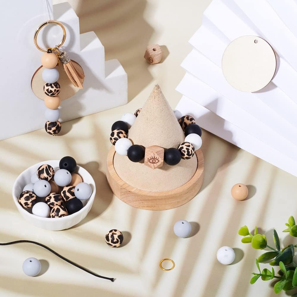 Kit de fabricación de pulseras de silicona, 64 cuentas redondas de silicona con 4 cuentas de madera octágonas con patrón de ojos, 4 colgantes de