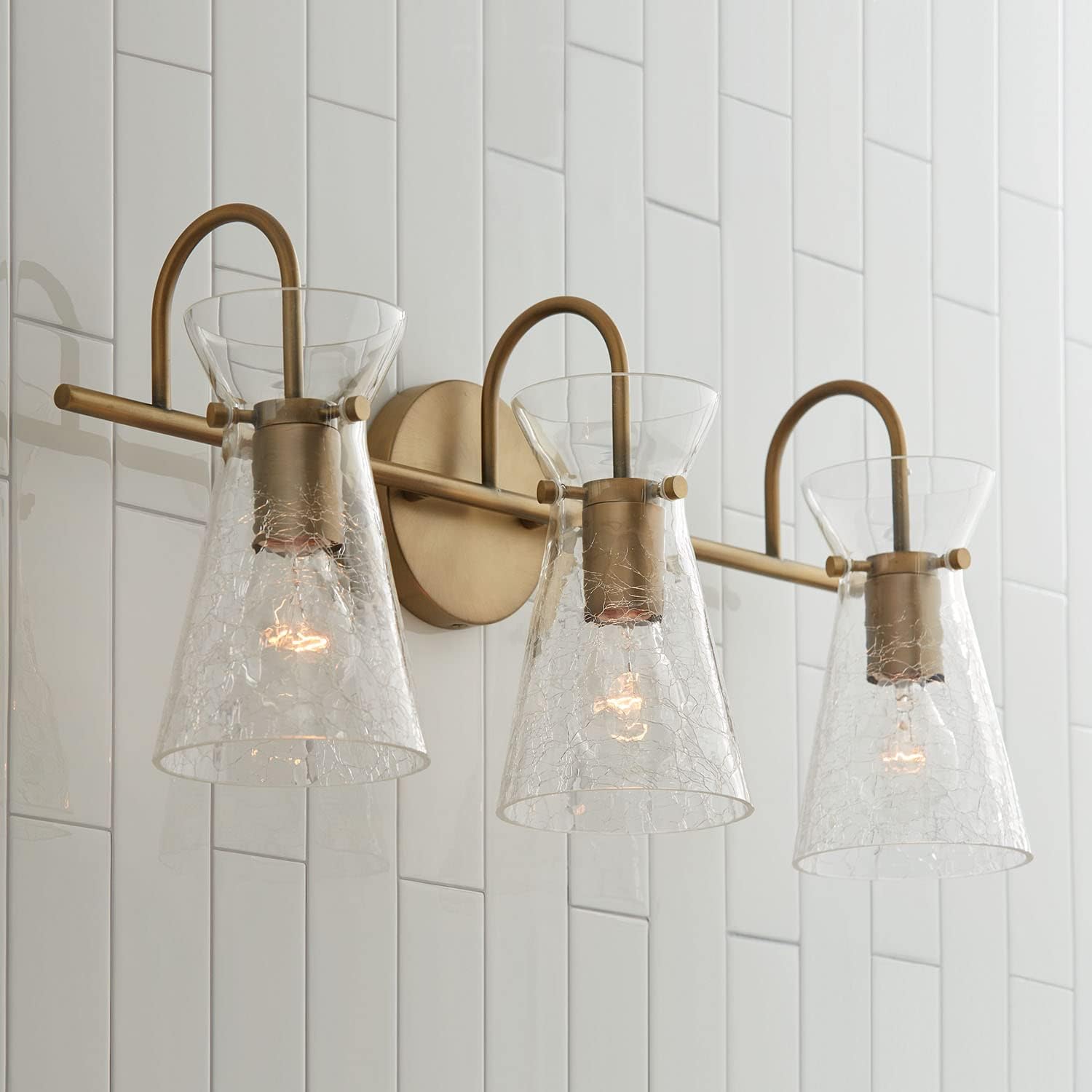 Capital Lighting 142431AD Mila – Soporte de pared para tocador de baño de vidrio medio agrietado, 3 luces, 300 vatios totales, 11 pulgadas de alto x