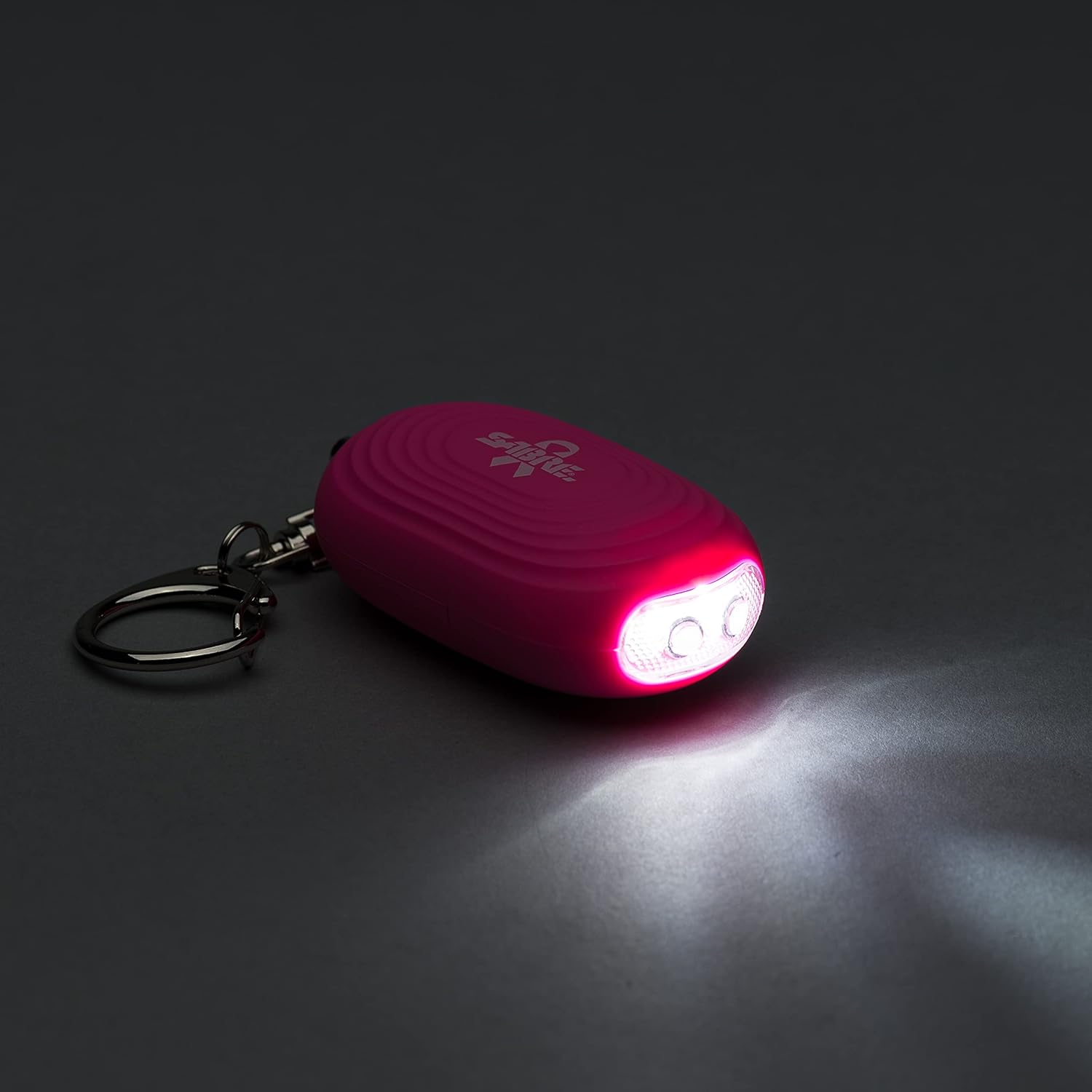SABRE Alarma personal 2 en 1 con luz LED, sirena de seguridad personal de 130 dB, gancho a presión para acceso instantáneo, rango de 1,250 pies,