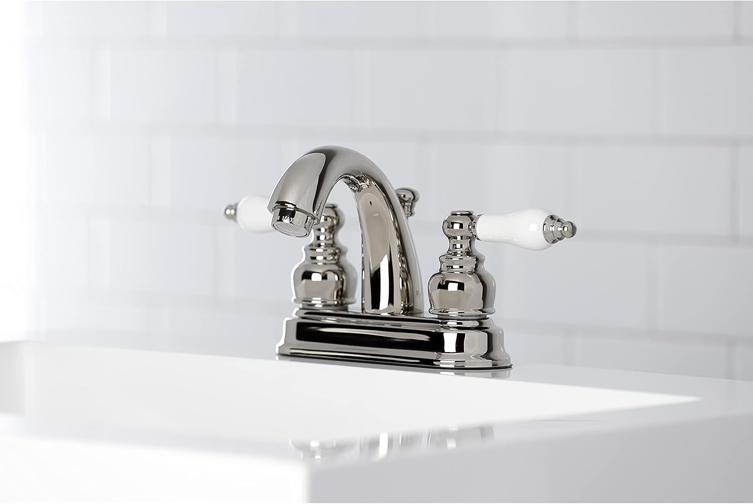 Kingston Brass KB5616PL Restoration – Grifo de baño central de 4 pulgadas, níquel pulido