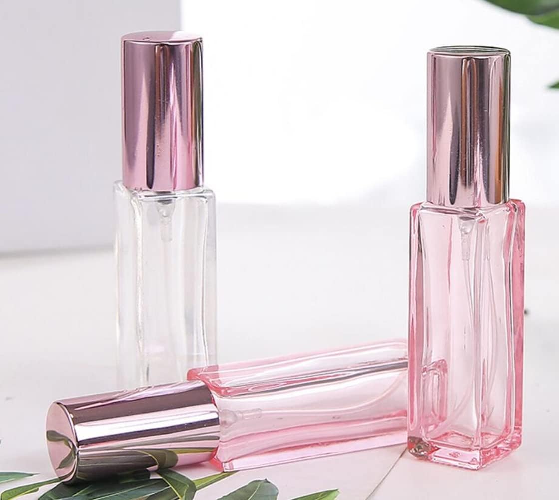 Botellas de perfume de vidrio de 0.7 onzas líquidas, botellas vacías de perfume en aerosol rosa con tapa de oro rosa, recargable, portátil,