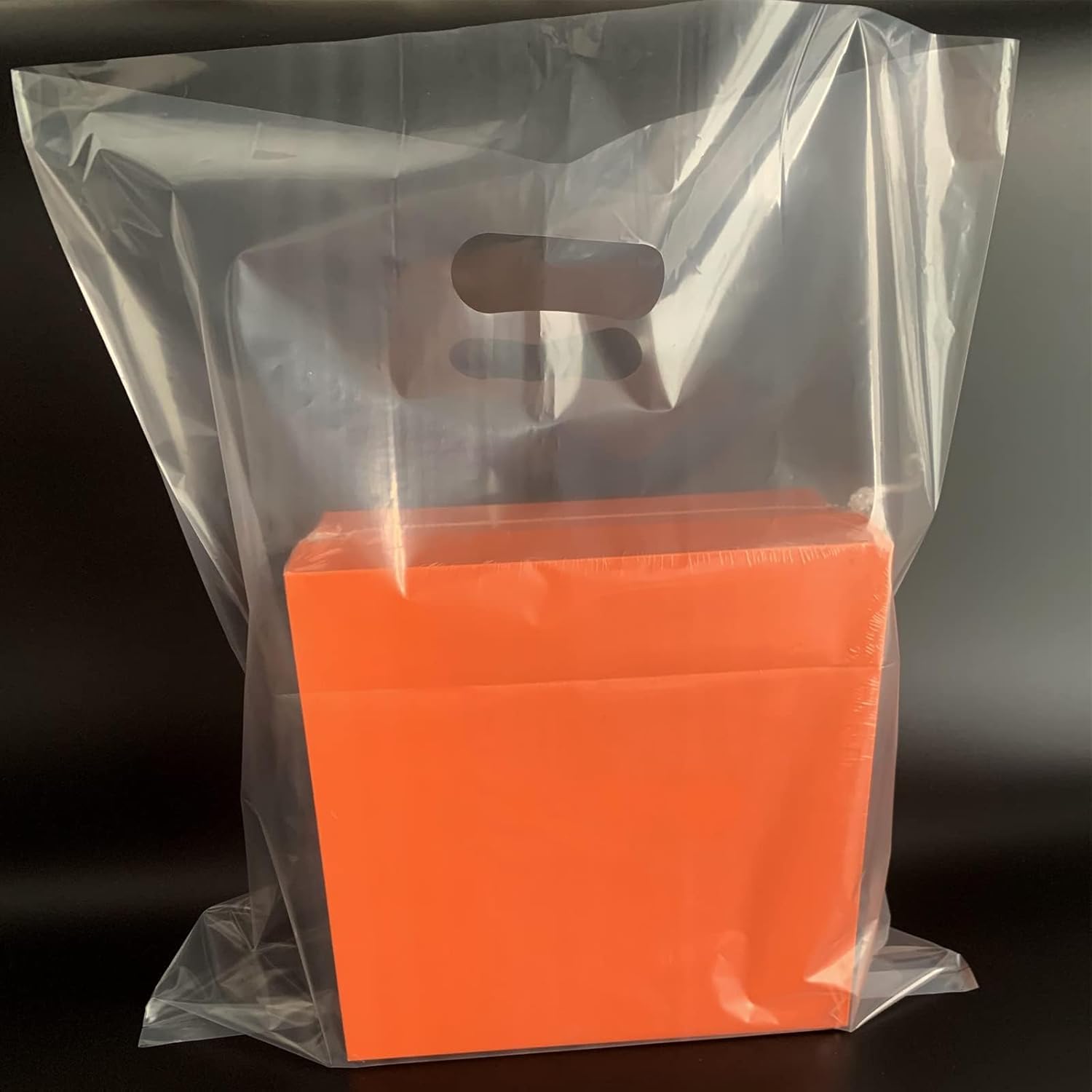 Paquete de 50 bolsas de plástico transparente extra grandes de 26 x 26 pulgadas con asas, feria comercial, recuerdos de fiesta y múltiples ocasiones
