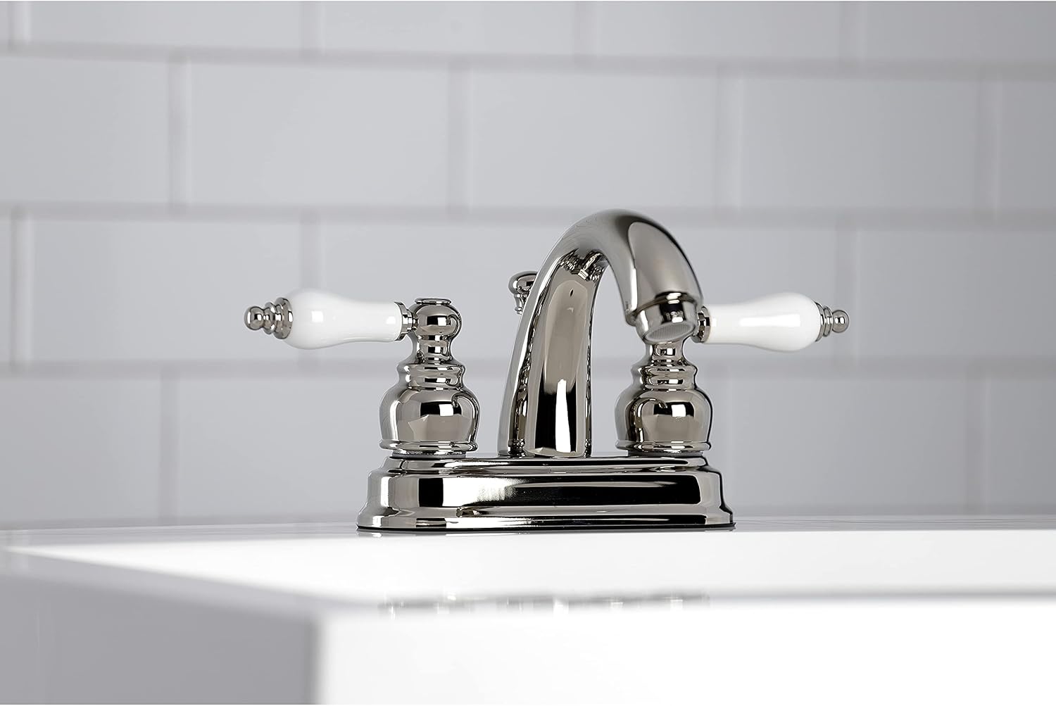 Kingston Brass KB5616PL Restoration – Grifo de baño central de 4 pulgadas, níquel pulido