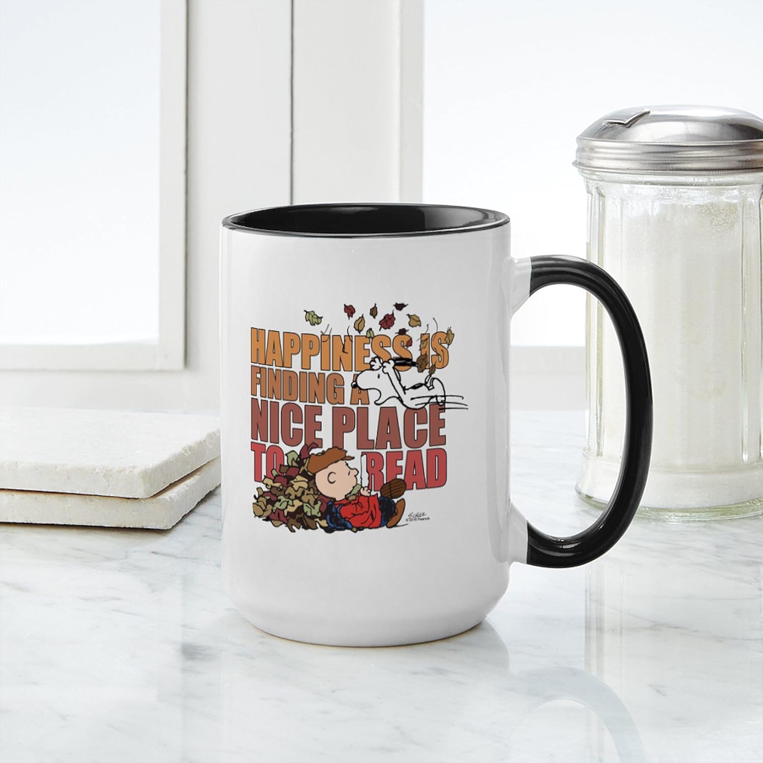 CafePress Peanuts Fall Reading – Taza grande de cerámica (15.0 fl oz)