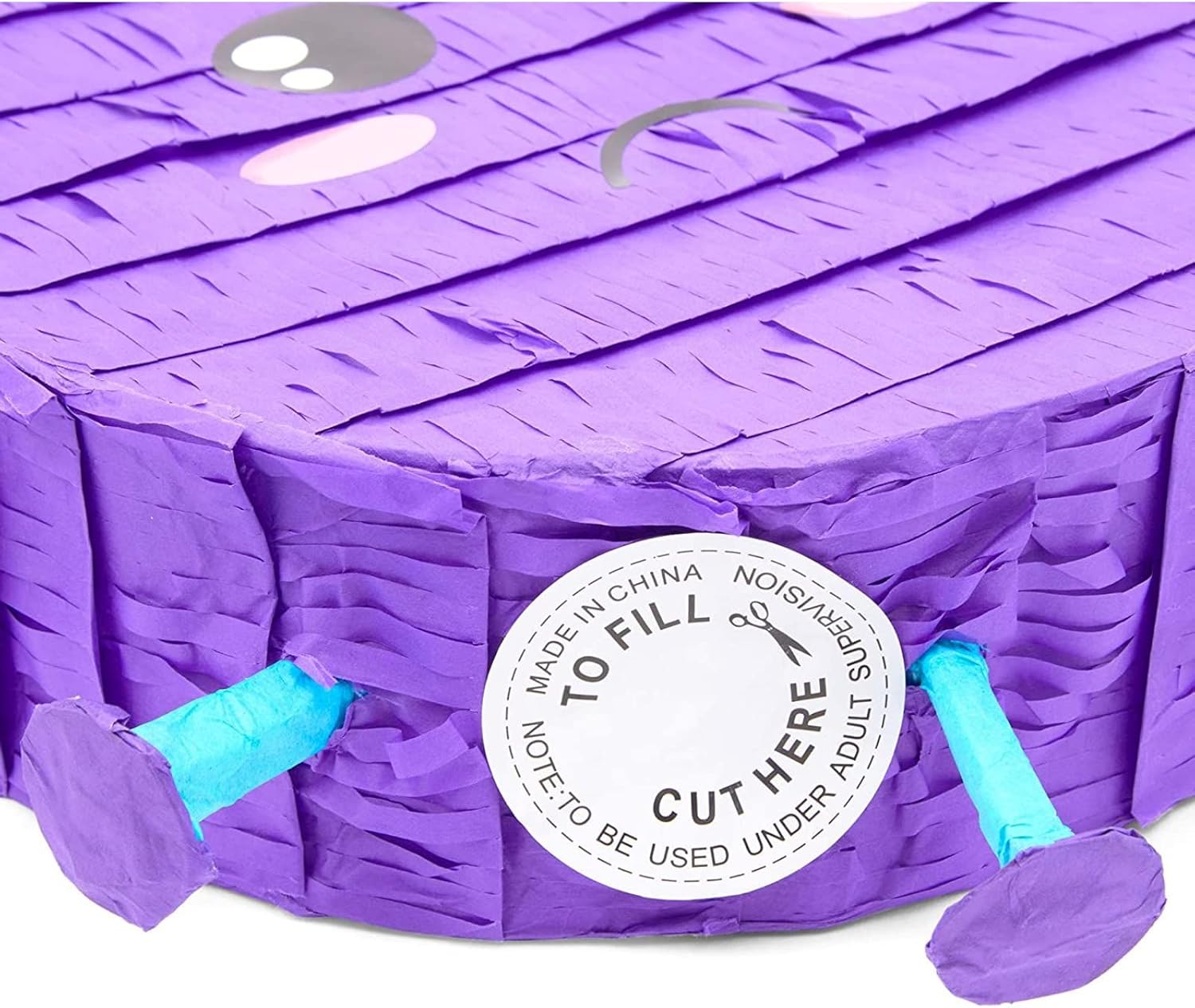 Piñata pequeña redonda morada para fiestas en casa