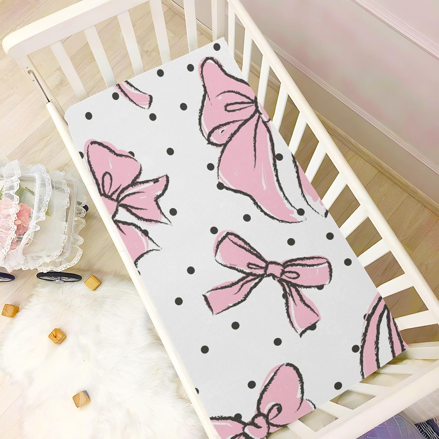 Sábana bajera ajustable para cuna de color rosa con lazo, para colchón estándar de cuna, suaves y transpirables para niños y niñas, 52 x 28 x 9